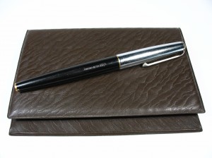 pen on portfolio case